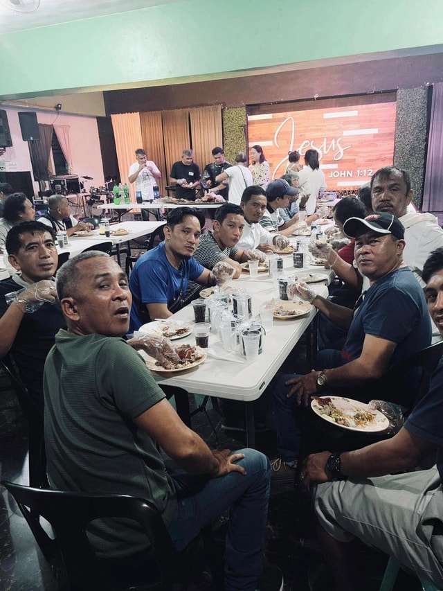Men of MCOF around the table at Ironmen