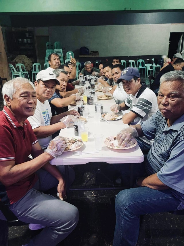 Men sharing a meal at an Ironmen fellowship